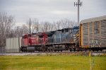 CP + CEFX AC44CW Locomotives leading a train